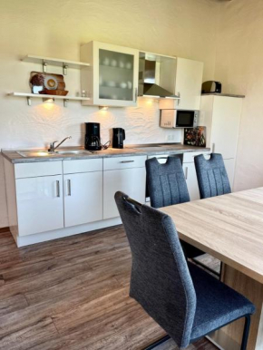Ferienwohnung Deichgraf mit Terrasse am Badesee Tannenhausen